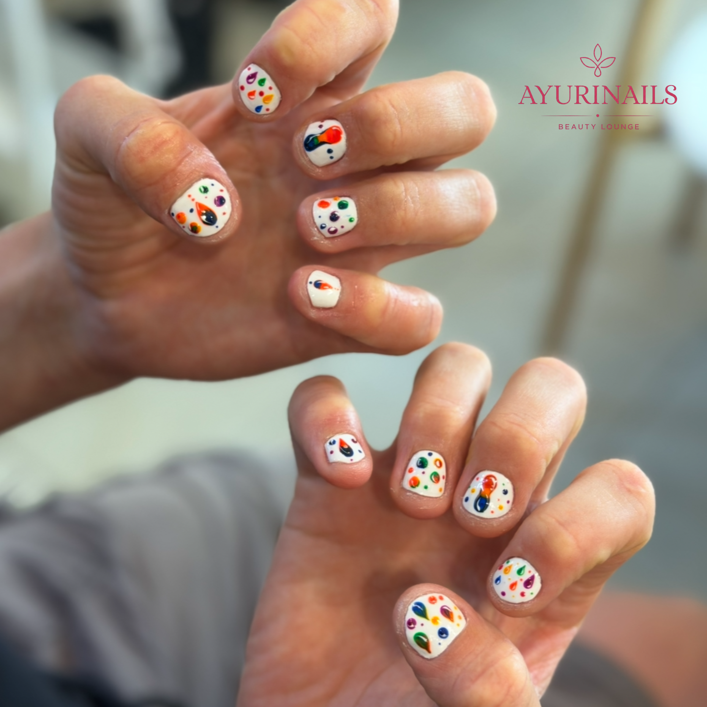 men's hand-painted colourful dot nail art at AyuriNails Beauty Lounge Makati